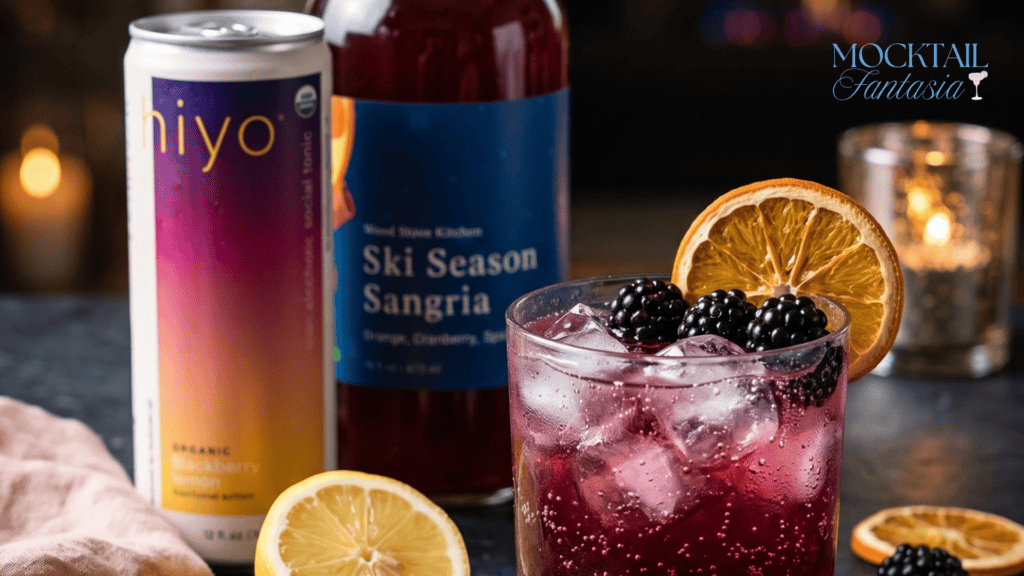 Midnight Bramble Fizz blackberry mocktail with orange slice and blackberries